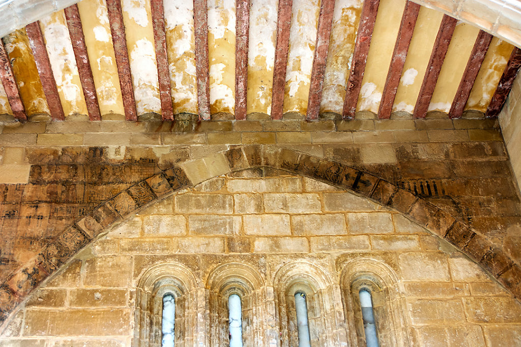 Just inside the doors