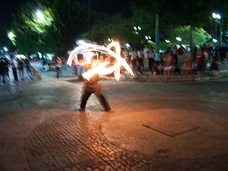 Cozumel square fire juggler
